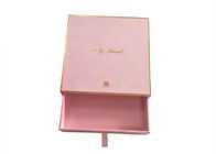 कॉस्मेटिक पैकेजिंग स्लाइडिंग पेपर बॉक्स गुलाबी बनावट वाला पेपर गोल्ड फ़ॉइल लोगो टिकाऊ आपूर्तिकर्ता