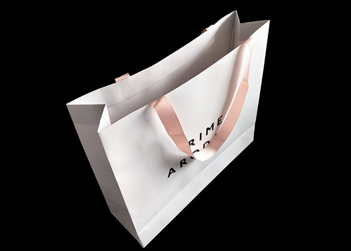 क्राफ्ट व्हाइट पेपर शॉपिंग बैग रिव्न हैंडल पेपर किराने के बोरे के साथ यूवी लोगो प्रिंटिंग आपूर्तिकर्ता